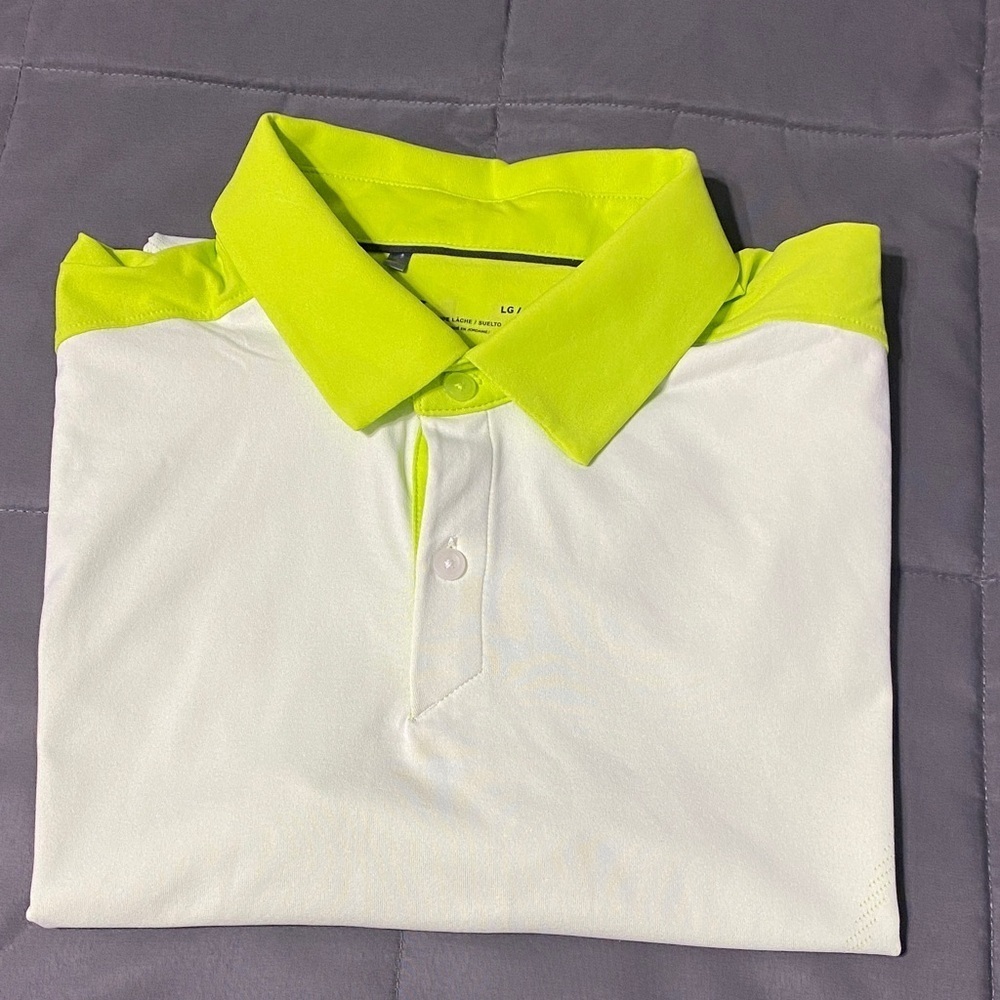 Under Armour loose fit Heat Gear polo. 
Size Large